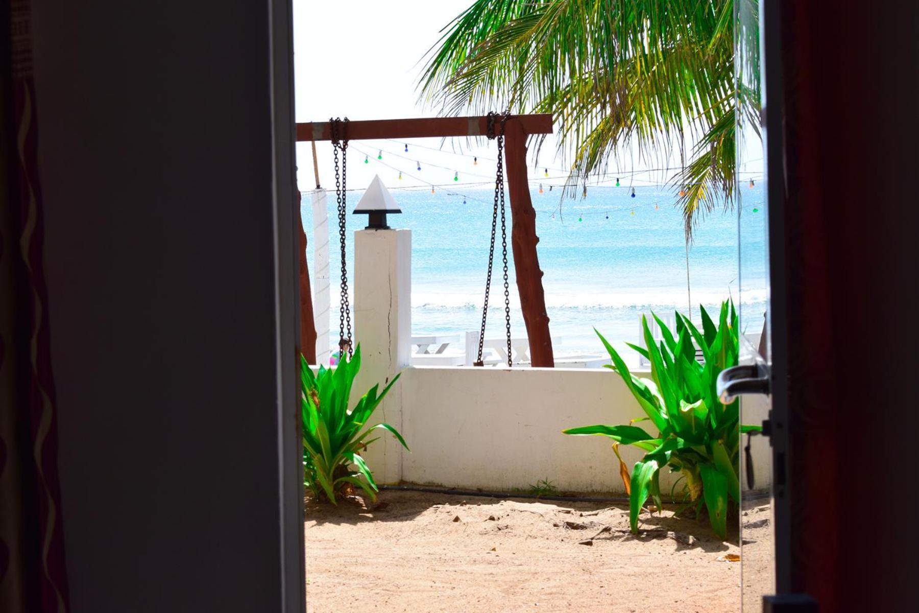 טרינקומאלה Golden Beach Cottages מראה חיצוני תמונה