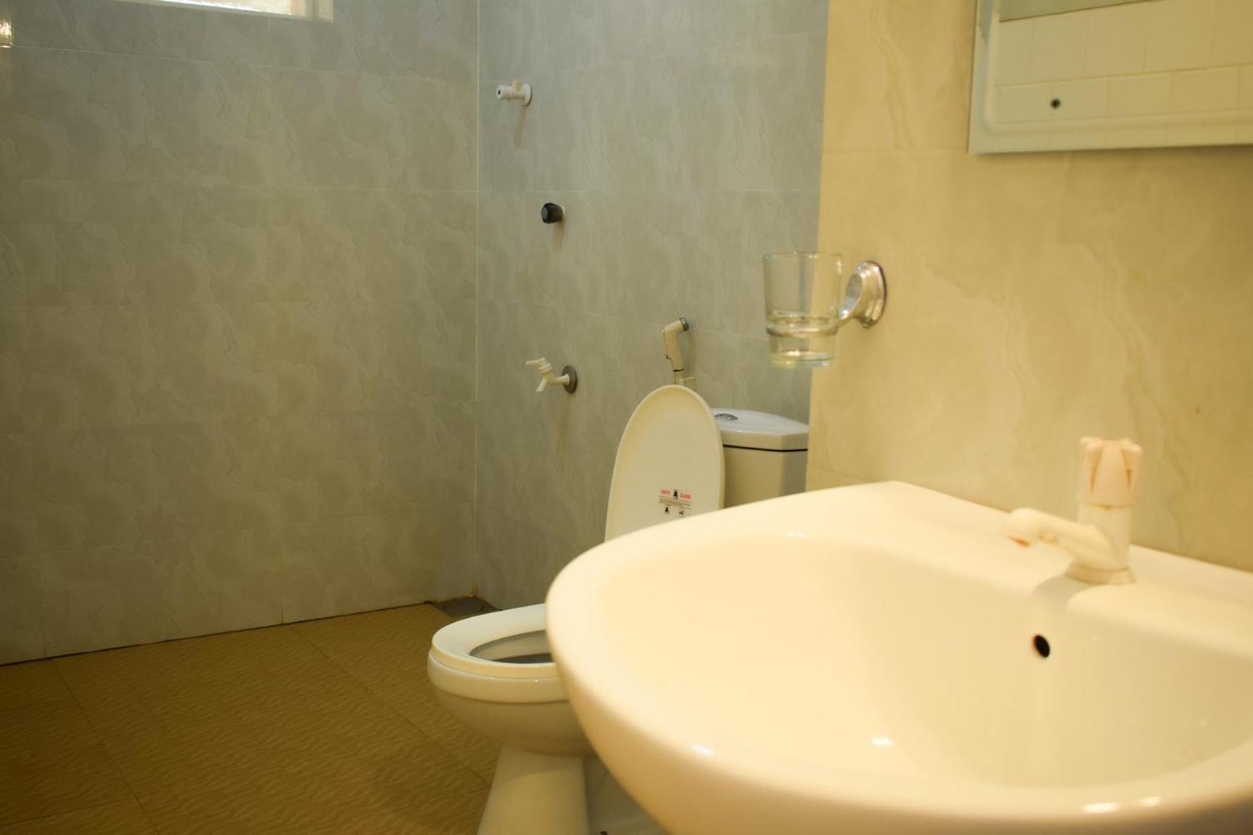טרינקומאלה Golden Beach Cottages מראה חיצוני תמונה